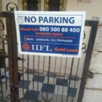 No parking boards placed at the entrance of an apartment complex for continuous brand exposure