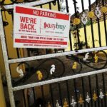 No parking boards placed at the entrance of an apartment complex for continuous brand exposure.