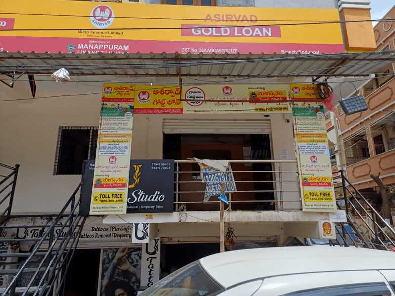 Corporate-sponsored non-light arch gate at an event entrance
