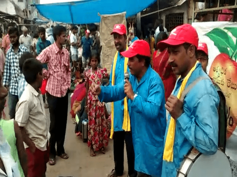 A team of street performers enacting a brand message in an outdoor public space