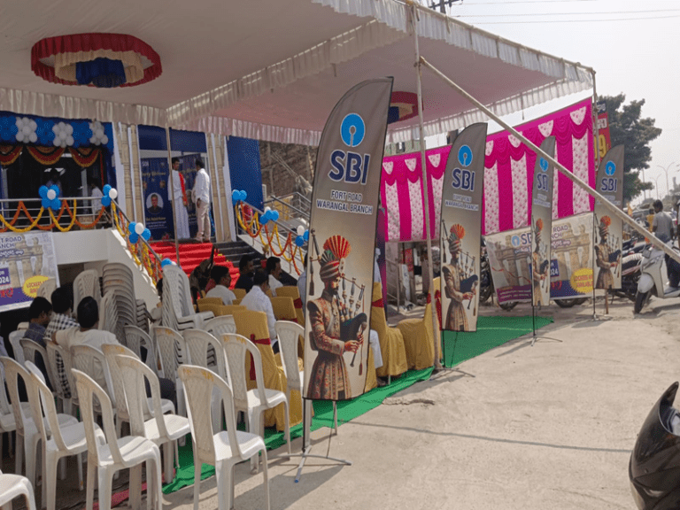 Outdoor feather flags placed outside a retail store for brand promotion.