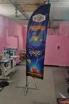 High-visibility feather flag for store and event branding.