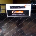 No Parking Board Advertising - A branded no parking board installed outside a retail store, ensuring brand visibility to customers and passersby.