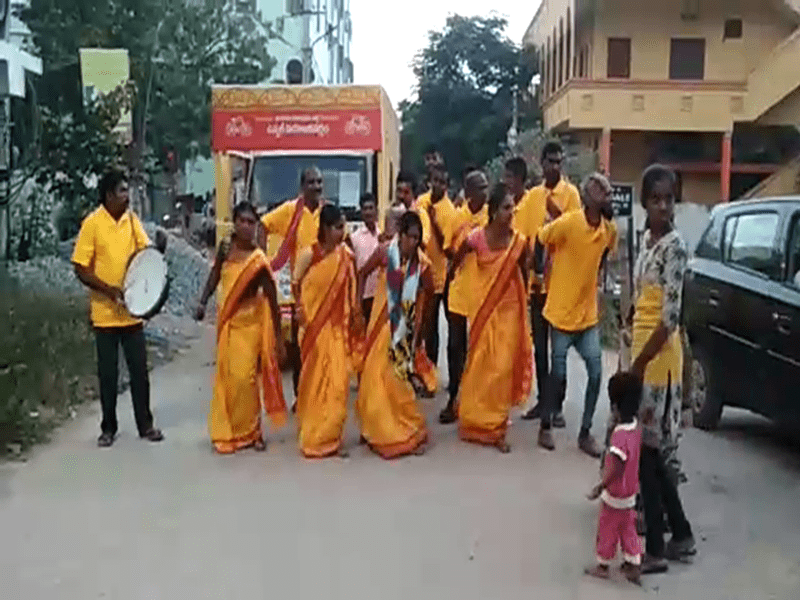 A street play performance for a financial services company, explaining loan benefits to passersby