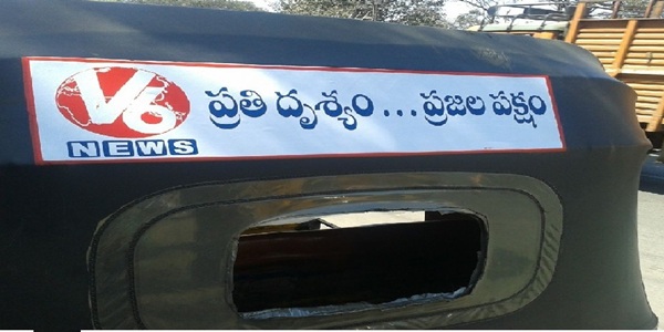 A lineup of auto-rickshaws with Auto Tattoos displaying different brand advertisements.