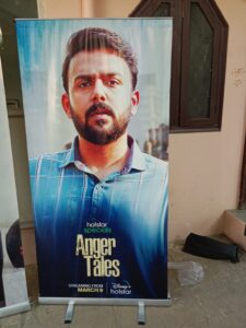 Roll-Up Banner Stand placed inside a retail store for product promotion.