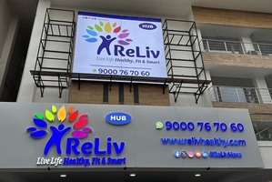 Flex board signage installed outside a retail store.