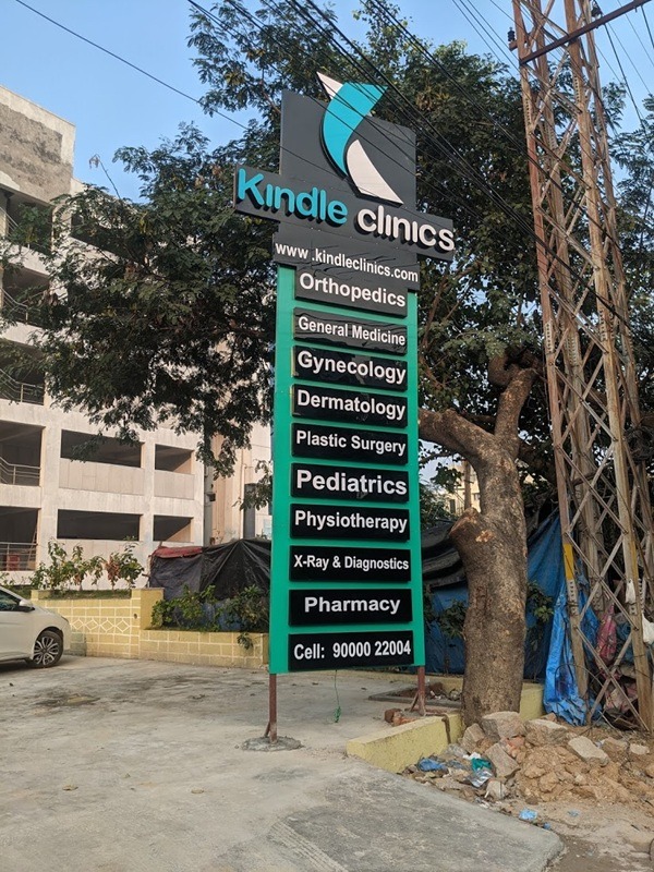 Tall illuminated Pylon Signage installed near a highway