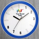 Wall clock Custom-branded plastic wall clocks with company logo.