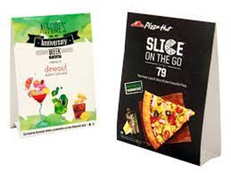Fold-able tent cards for product promotions in a retail store.