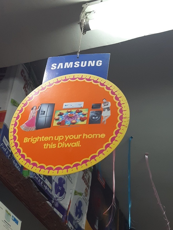 Supermarket danglers with festive discount offer.