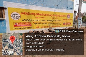 Wall Painting Advertising - A brightly colored wall painting advertisement along a busy highway promoting a telecom brand.