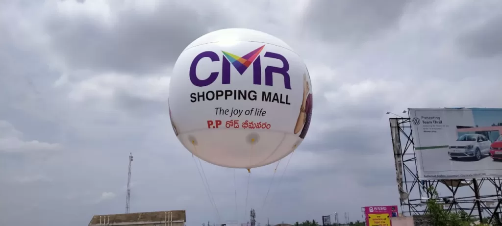 Inflatable Advertising Balloon - Floating helium balloon with custom brand logo and tagline.