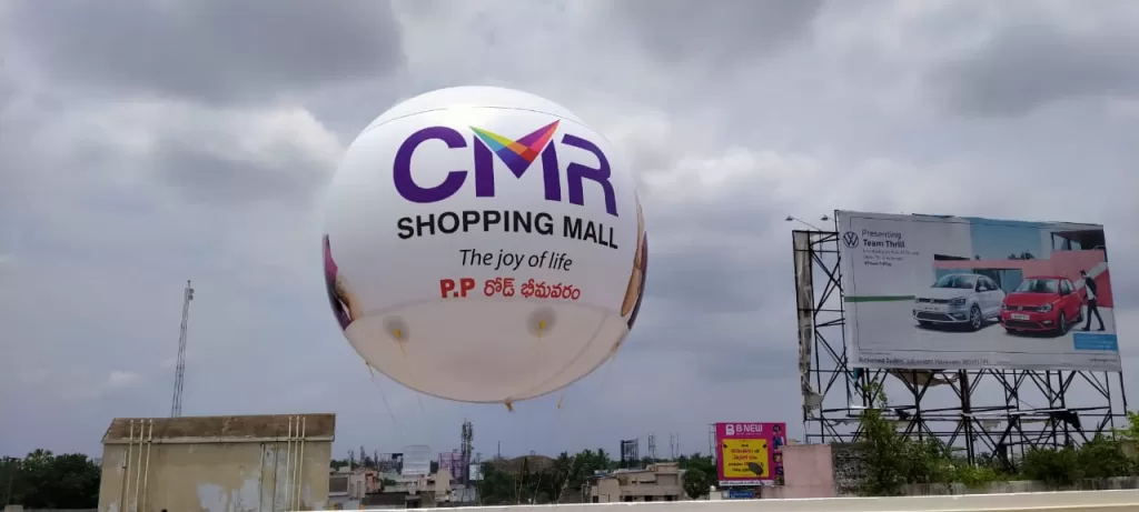 Inflatable Advertising Balloon - Floating helium balloon with custom brand logo and tagline.