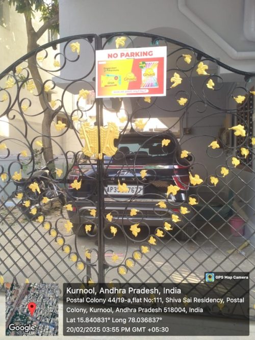 A strategically placed no parking board in a public parking space, increasing brand awareness among vehicle owners.